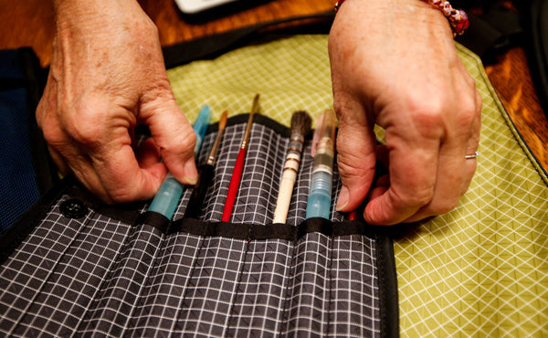 A Pen Tool Wrap filled with various sizes of art brushes.